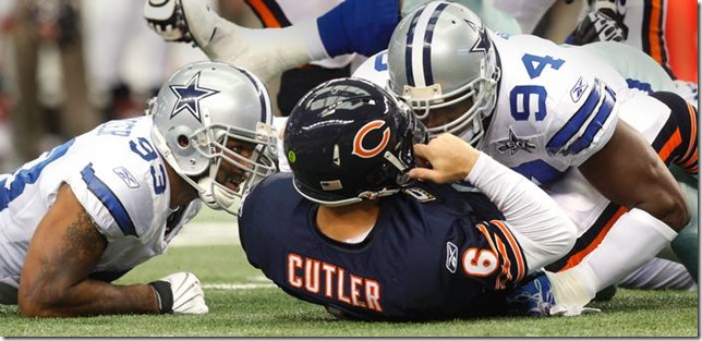 DeMarcus Ware and Anthony Spencer introduce themselves to Chicago QB Jay Cutler