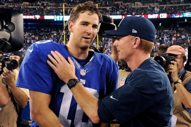 Dallas Cowboys head coach Jason Garrett, right, talks to New York Giants quarterback Eli Manning - The Boys Are Back blog