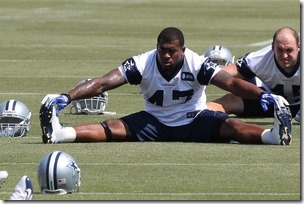 May 23, 2012; Irving, TX, USA; Dallas Cowboys fullback Lawrence Vickers (47) stretches during organized team activities at Dallas Cowboys headquarters.  Mandatory Credit: Matthew Emmons-US PRESSWIRE